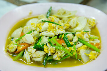 Stir-Fried Crab in Curry Powder on white plate