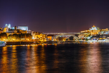 Fototapeta premium Nightscape of Porto and famous bridge over Douro river, Portugal