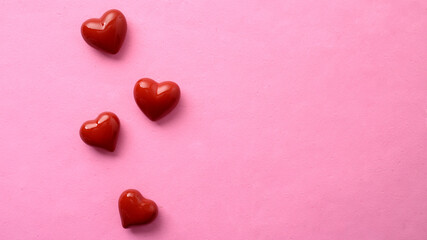 frame red hearts on pastel pink background