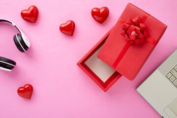 Valentine gift in holiday decoration on pink