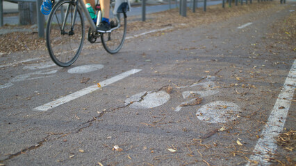 Colorful and sunny bicycle lane with a bike symbol in autumn with a cycle in mouvement - Cycle path in Marseille, France, European City