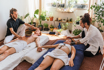 Happy Couple Enjoying Massage