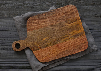 Cutting board on wooden table