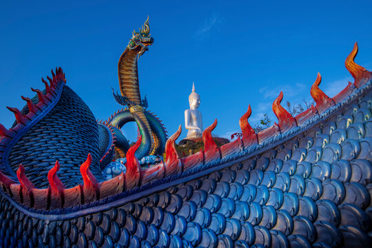 Statue of Naka Buddha and large Buddha statue at Mukdahan Province,Big Buddha Wat Phu Manorom Mukdahan Thailand.