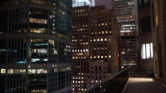 Gorgeous Night-Time Tilt-Up View of Skyscraper Buildings from the 18th Floor in New York City