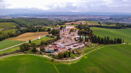 Fototapeta na wymiar aerial view of tuscan hill in Colle di Val d'elsa, Chianti region, Siena province. Tuscany region, Italy. Farmhouse Tenuta di Mensanello.