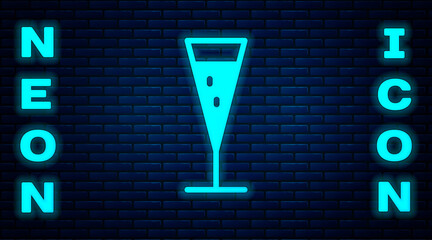 Glowing neon Glass of champagne icon isolated on brick wall background. Vector Illustration.