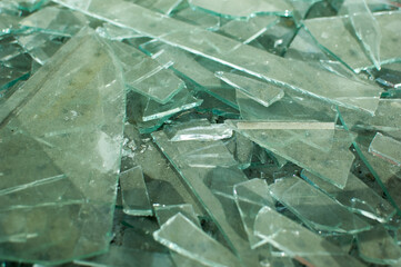 Shattered, splitted and dirty glass pieces