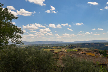 Fototapeta na wymiar Elevated view of the hills surrounding the old town of San Gimignano, in the province of Siena, Tuscany, Italy