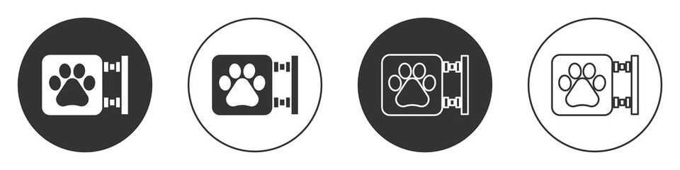 Black Veterinary clinic symbol icon isolated on white background. Cross hospital sign. A stylized paw print dog or cat. Pet First Aid sign. Circle button. Vector.