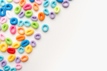colored elastic bands for hair on a white background