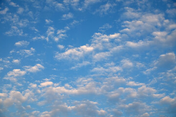 Beautiful sky landscape with many soft light white clouds high in the stratosphere on a sunny day horizontal photo