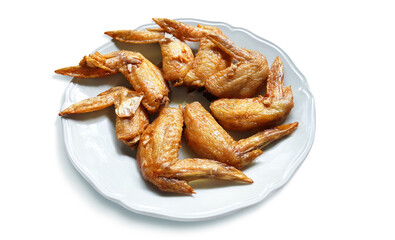 Garlic fried chicken wings on a separate white plate with white background