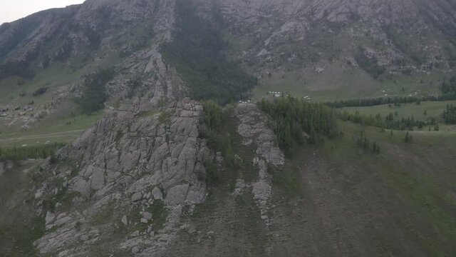 drone shot of Majestic Terelj National Park that have many green trees, mountains, rocks in mogolia