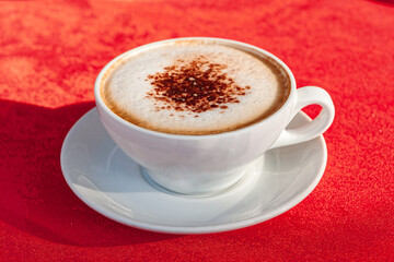coffee cup isolated on red background