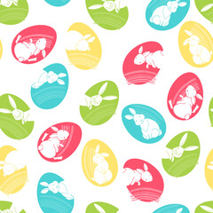 Seamless vector pattern with colorful Easter eggs and cute rabbits on white. Vector.