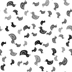 Black Rubber duck icon isolated seamless pattern on white background. Vector.