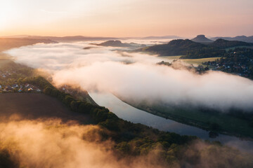 A serene sunrise above the river.