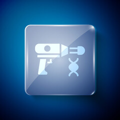 White Transfer liquid gun in biological laborator icon isolated on blue background. Square glass panels. Vector.
