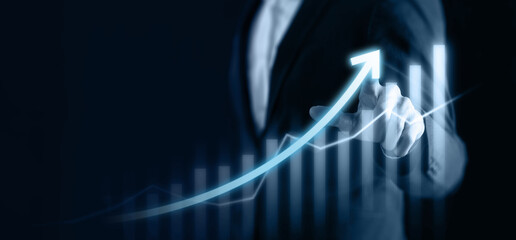business concept, business man try to predict economic by point and dragging the growth graph to make a benefit, profit, trend, market, success, grow up, turnover, financial,moeny