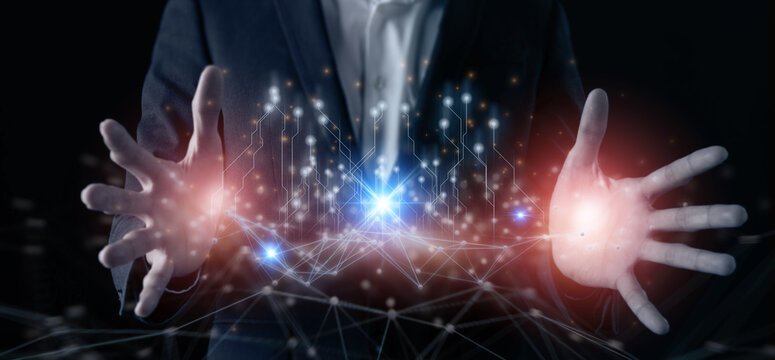 futuristic technology concept, business man hold a hand for analysis data of community network in circuit wireframe, internet of behaviors iob the new normal of technology to recieve data analysis