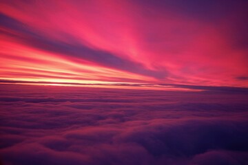 Fototapeta premium Sunrise from above the clouds