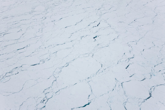 Aerial view over sea ice, nr Kulusuk, Greenland