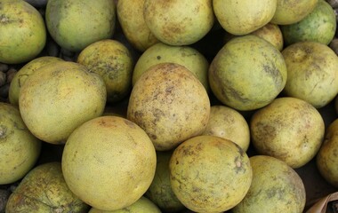Pyrus, many fresh pears in the shop with pears background.
