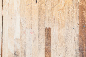 Exposed wooden wall exterior, patchwork of raw wood forming a beautiful parquet wood pattern,wood wall pattern