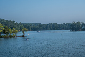 Fototapeta na wymiar Kayaking and boating on the lake