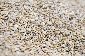 Background of peeled sunflower seeds sold at local city market