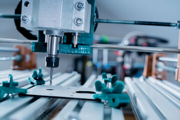 CNC milling machine cutting aluminium  part.