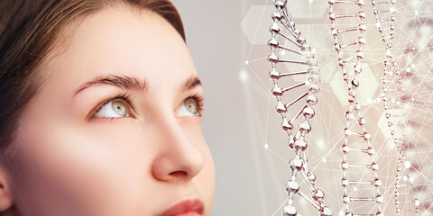 Beautiful sensual woman and glass DNA stems over beige background. Science of beauty concept.