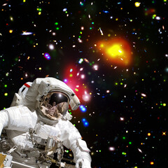 Obraz na płótnie Canvas Astronaut and light. Science theme. The elements of this image furnished by NASA.