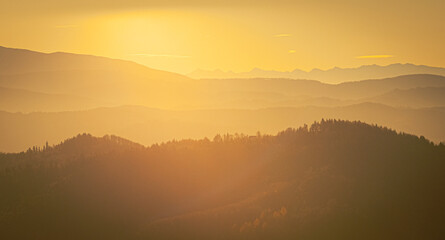 Sunlit layers of hills, early morning