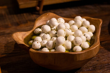 Quail eggs in canned olive tapenade.