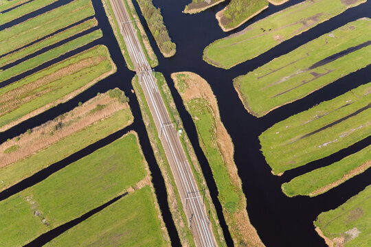 Railway line & polder or re-claimed lands, North Holland, Netherlands