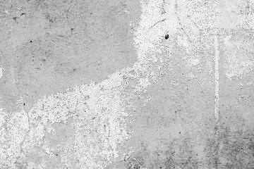 Texture of a concrete wall with cracks and scratches which can be used as a background
