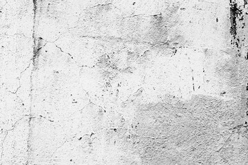 Texture of a concrete wall with cracks and scratches which can be used as a background