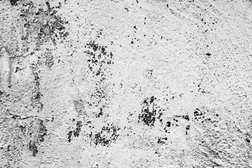 Texture of a concrete wall with cracks and scratches which can be used as a background