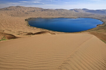 Full Nuoertu lake-view from western megadune-Badain Jaran desert. Inner Mongolia-China-1189