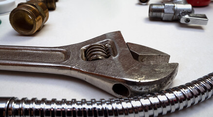 plumbing tools and equipment on white background