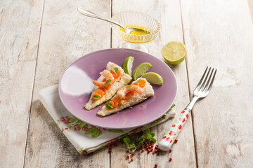 fish fillet with shrimp pink pepper carrots and lime