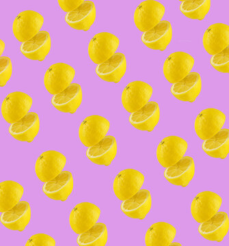 Floating Lemon Sliced On Pink Background.