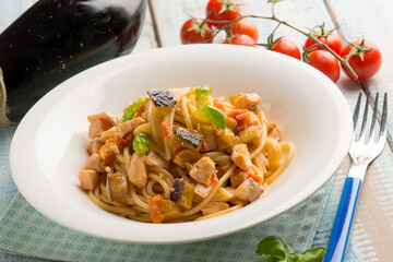 spaghetti with fresh salmon tomatoes and eggplant
