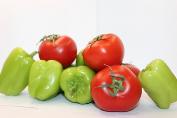 Fototapeta na wymiar tomato and pepper. red green 