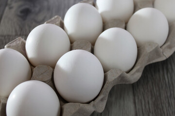 white chicken eggs on the table