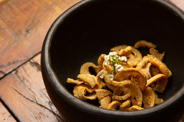 Delicious appetizer of fried pork rinds.