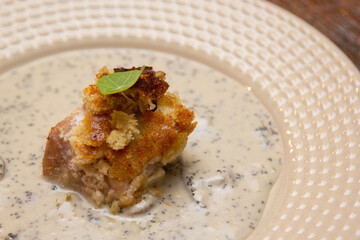 Xareu fish in crust with caviar sauce.