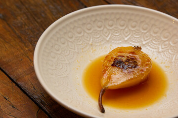 Dessert Pear Brulee stuffed with Gorgonzola cheese